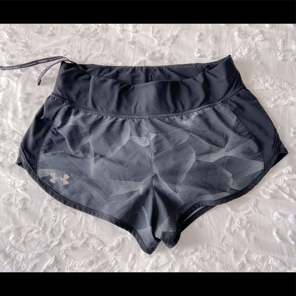 black pattern running shorts